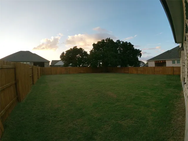 a view of outdoor space and yard