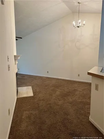 a view of a room with an empty space