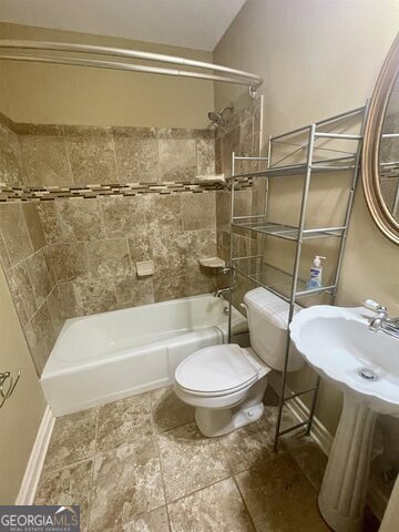 242 Ebenezer Church Road Fayetteville, GA 30215 - Photo 29 of 46 a bathroom with a sink toilet and shower