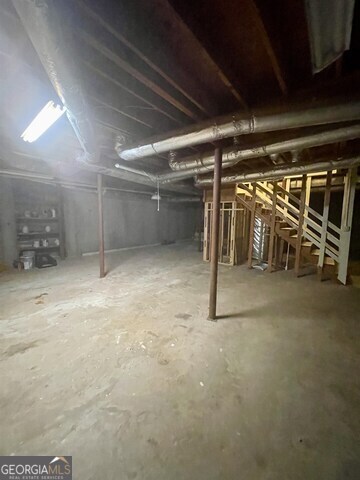 242 Ebenezer Church Road Fayetteville, GA 30215 - Photo 32 of 46 a view of empty room with wooden ceiling