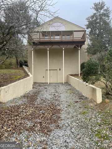 242 Ebenezer Church Road Fayetteville, GA 30215 - Photo 33 of 46 a front view of a house with garden