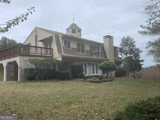 242 Ebenezer Church Road Fayetteville, GA 30215 - Photo 39 of 46 a front view of a house with garden