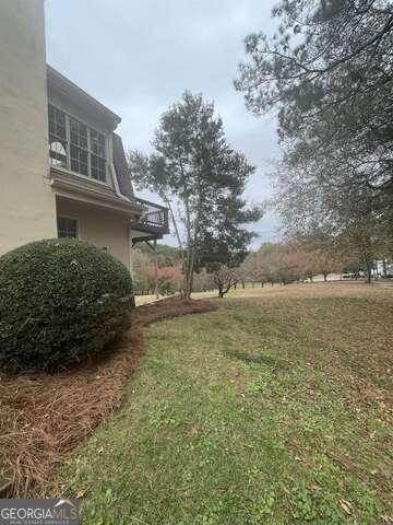 242 Ebenezer Church Road Fayetteville, GA 30215 - Photo 41 of 46 a view of a yard with an outdoor space