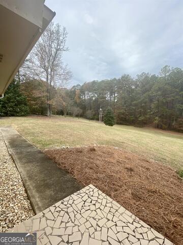 242 Ebenezer Church Road Fayetteville, GA 30215 - Photo 42 of 46 a view of an ocean beach and mountain