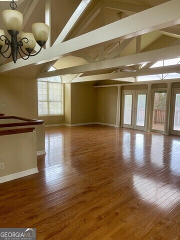 242 Ebenezer Church Road Fayetteville, GA 30215 - Photo 7 of 46 a view of an empty room with wooden floor