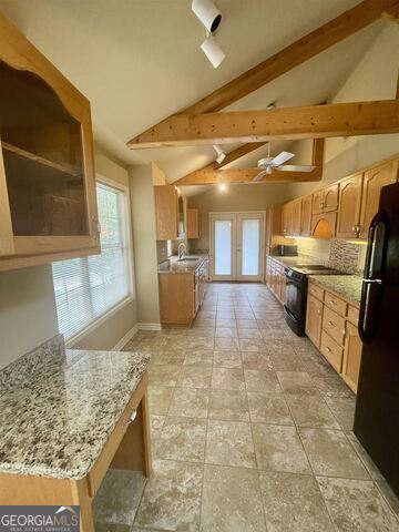 242 Ebenezer Church Road Fayetteville, GA 30215 - Photo 8 of 46 a view of a kitchen with a sink
