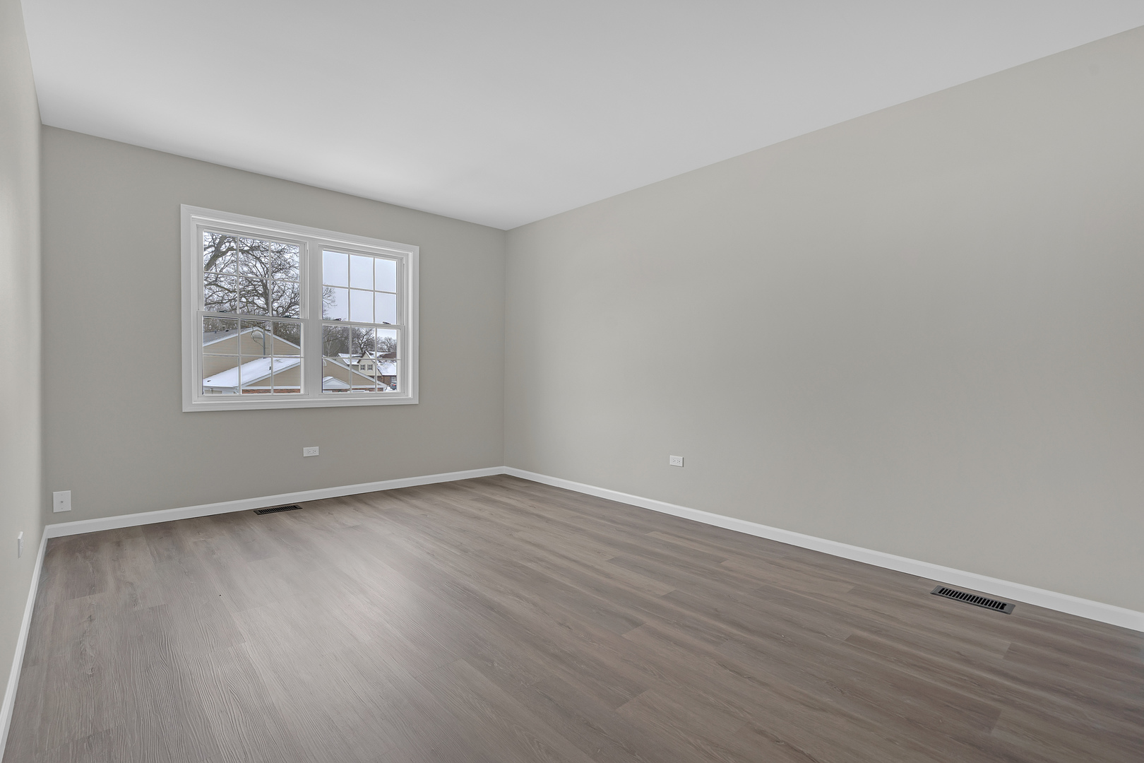 86 Silver Tree Circle Cary, IL 60013 - Photo 17 of 26 an empty room with wooden floor and windows