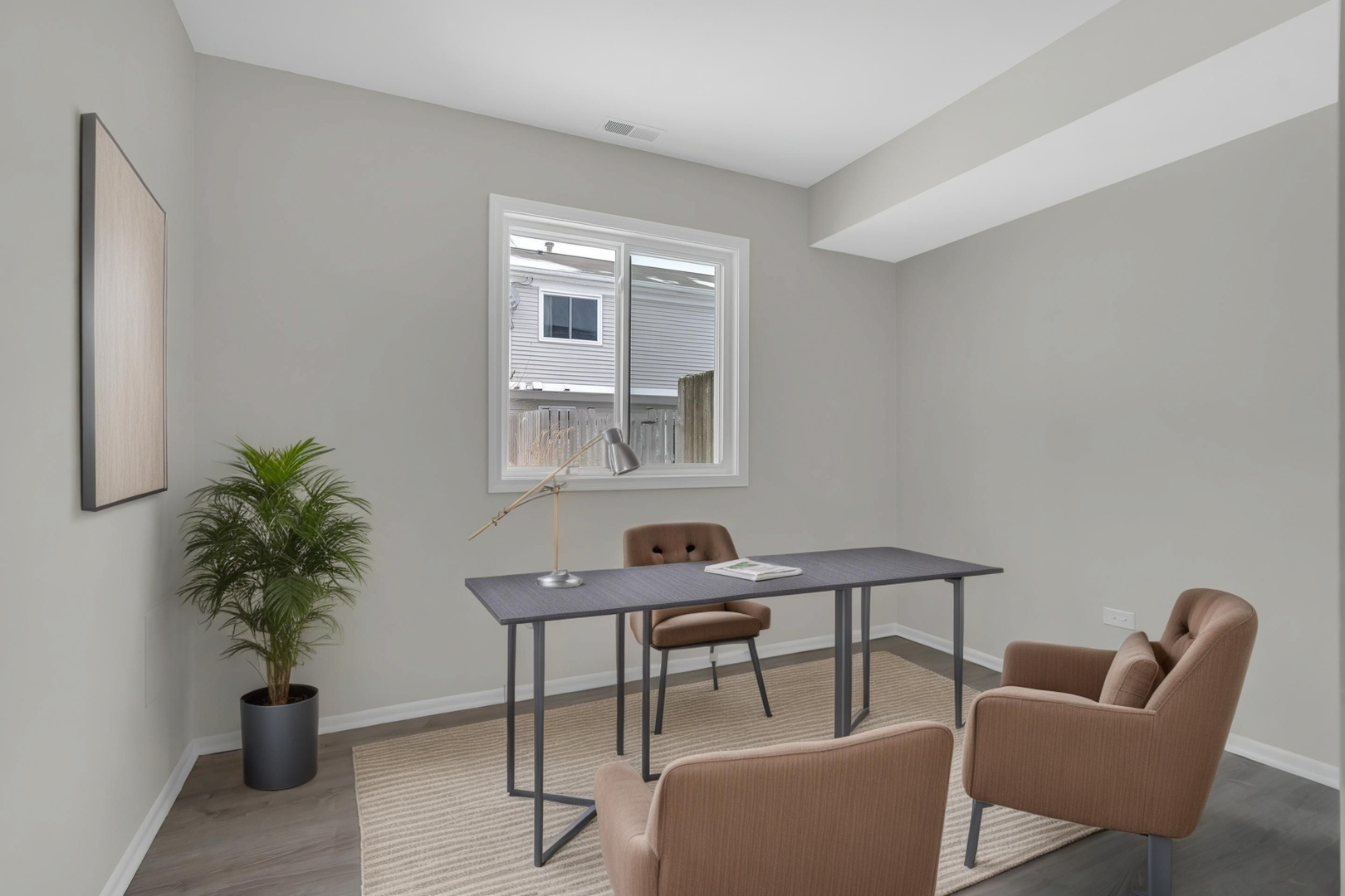 86 Silver Tree Circle Cary, IL 60013 - Photo 7 of 26 a work room with furniture and potted plant