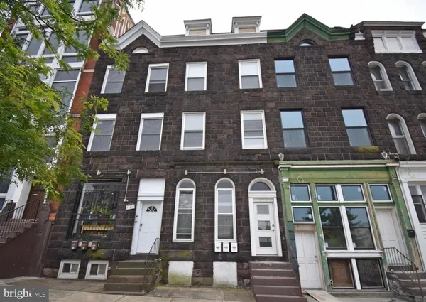 a front view of a multi story residential apartment building