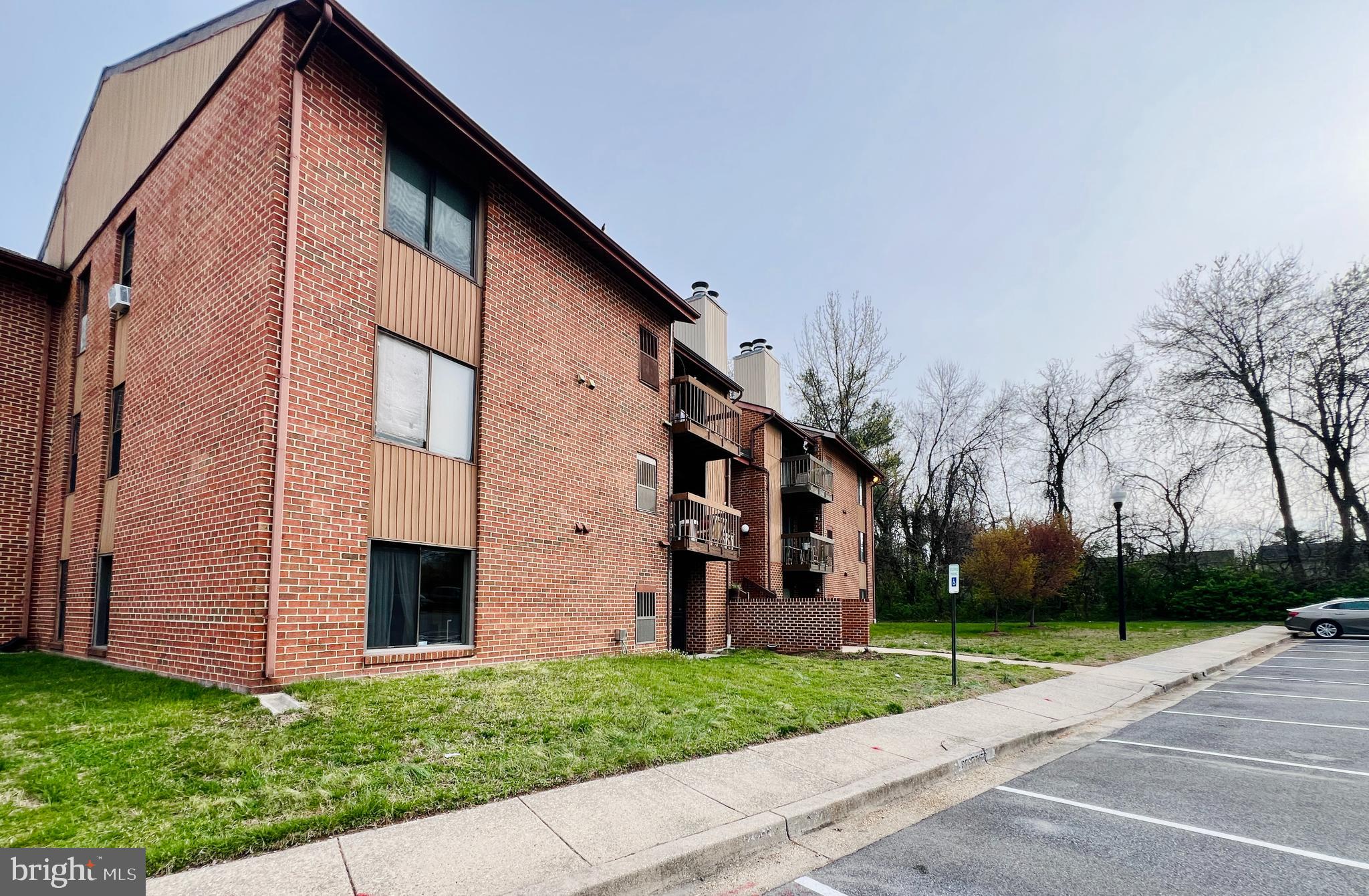 118 Mountain Road, Unit 1A Glen Burnie, MD 21060 - Photo 10 of 16 a view of a house with a yard