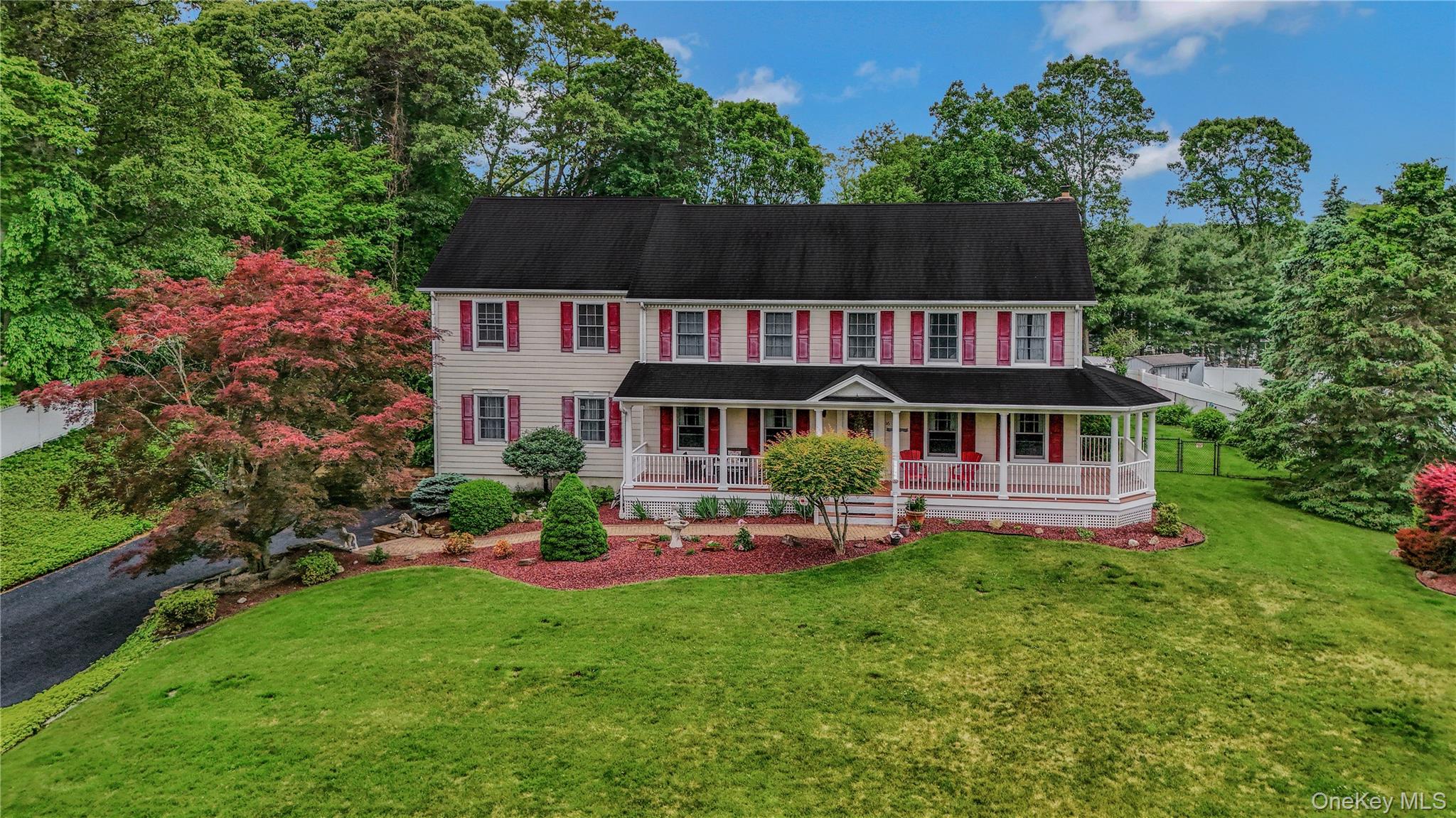 an aerial view of a house with garden