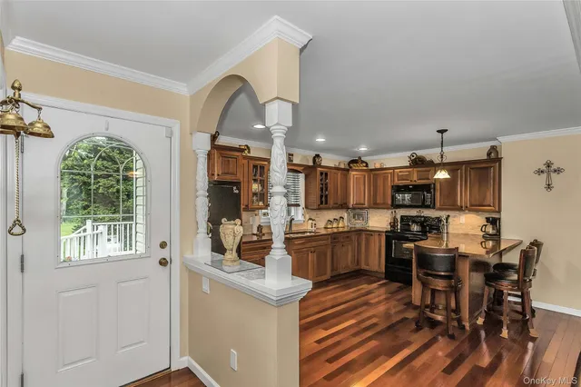 a view of a garden with a building in the background