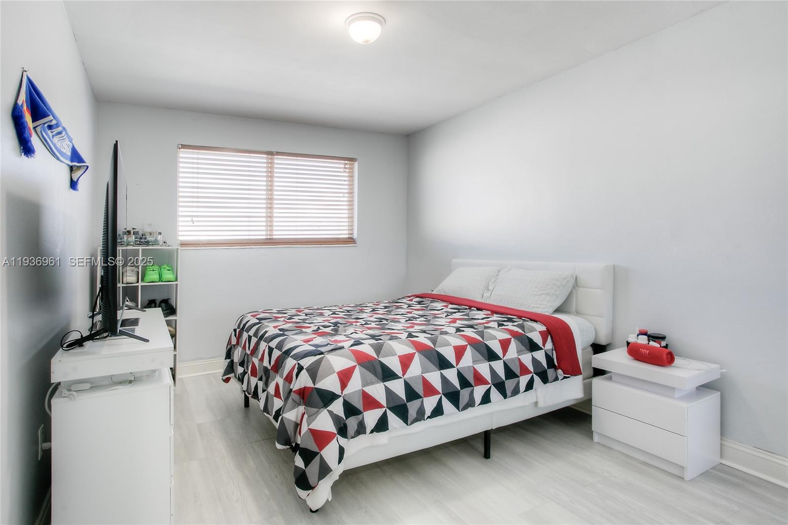 1925 West 72nd Street Hialeah, FL 33014 - Photo 12 of 15 a bedroom with a bed and a window