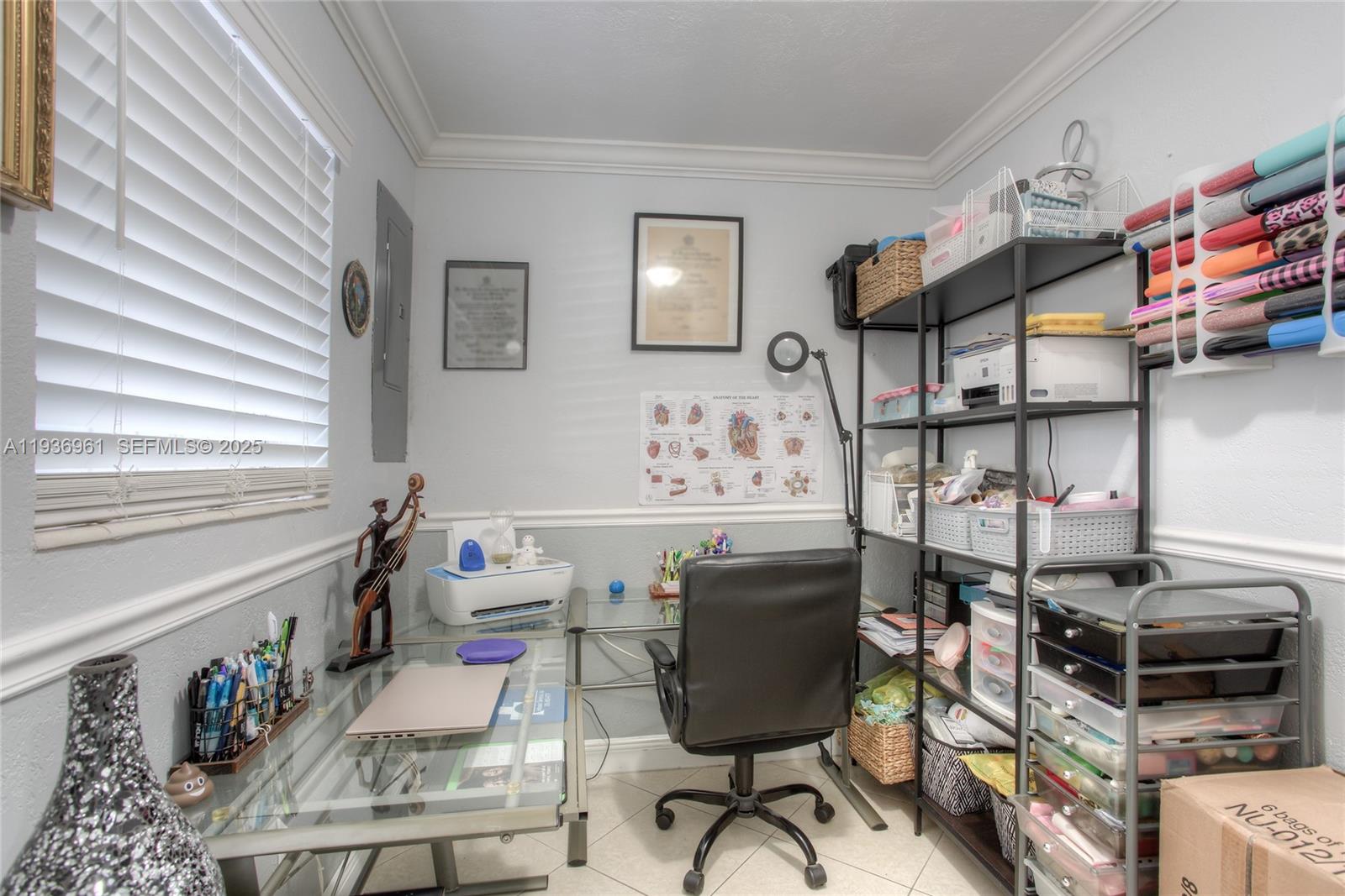 1925 West 72nd Street Hialeah, FL 33014 - Photo 7 of 15 a living room with furniture and a window