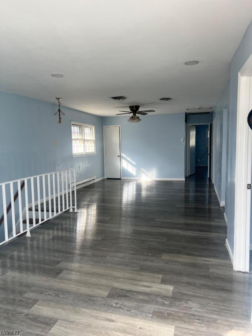 304 Concord Avenue Union, NJ 07083 - Photo 7 of 7 a view of empty room with wooden floor
