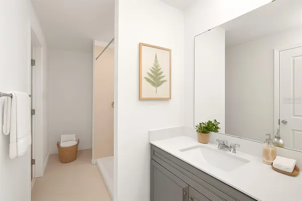 a bathroom with a sink and a mirror