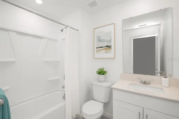 a bathroom with a granite countertop sink toilet a mirror and shower