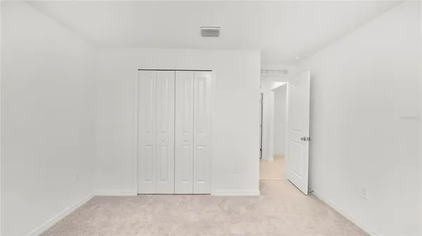 an empty room with closet