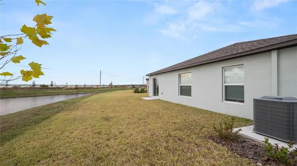 a view of a house with outdoor space and sitting area