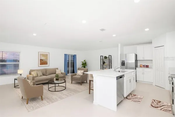 a living room with furniture and a table