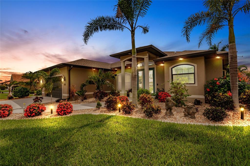 1469 Navigator Road Punta Gorda, FL 33983 - Photo 1 of 1 FRONT EXTERIOR - TWILIGHT