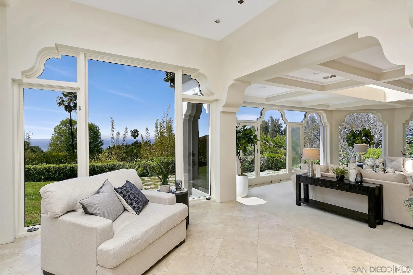 9660 Blackgold Road La Jolla, CA 92037 - Photo 13 of 32 a living room with furniture and a floor to ceiling window