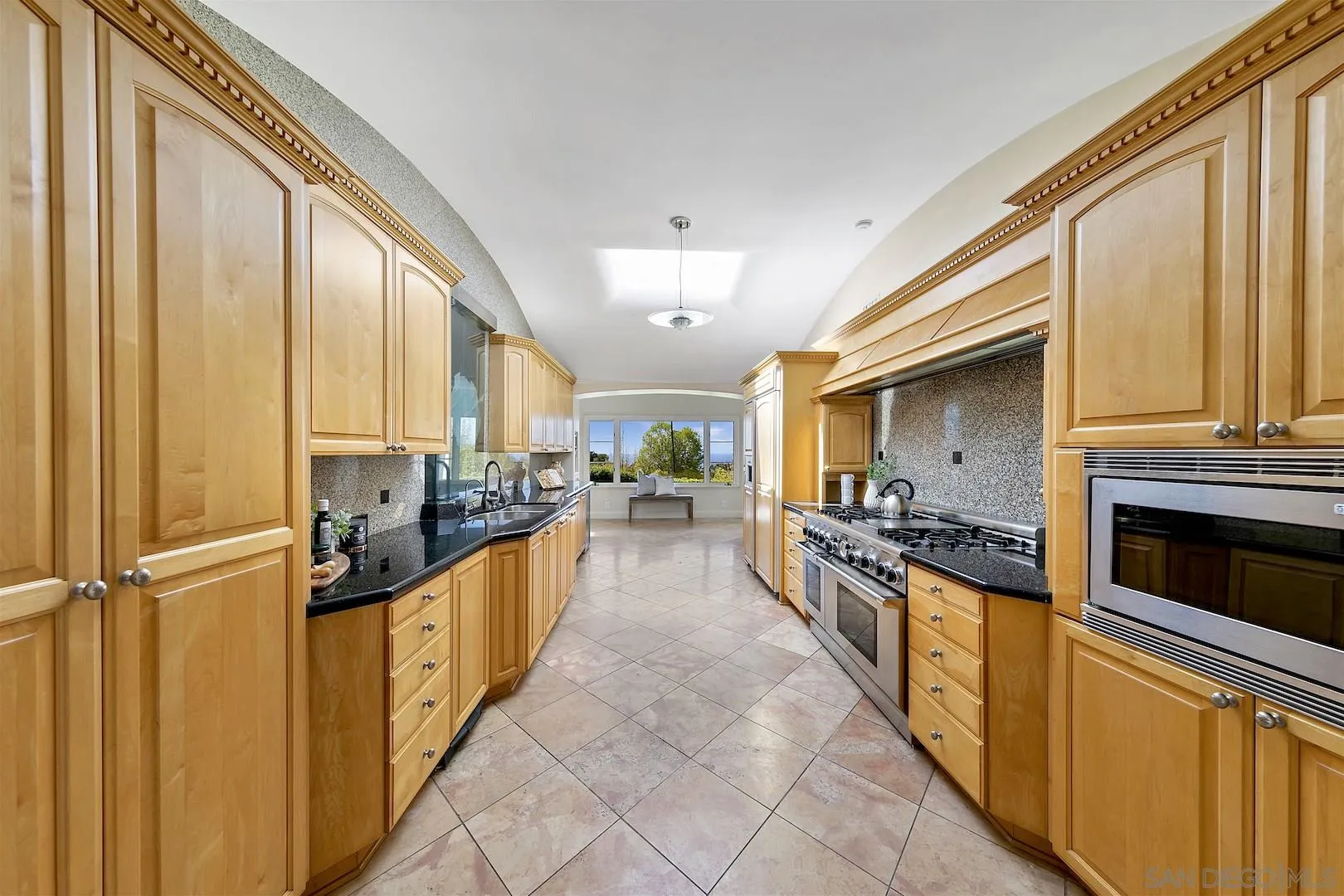 9660 Blackgold Road La Jolla, CA 92037 - Photo 14 of 32 a view of a kitchen with a sink and dishwasher
