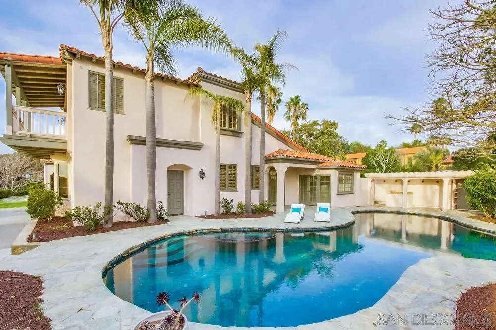 9660 Blackgold Road La Jolla, CA 92037 - Photo 28 of 32 a view of a swimming pool with a patio