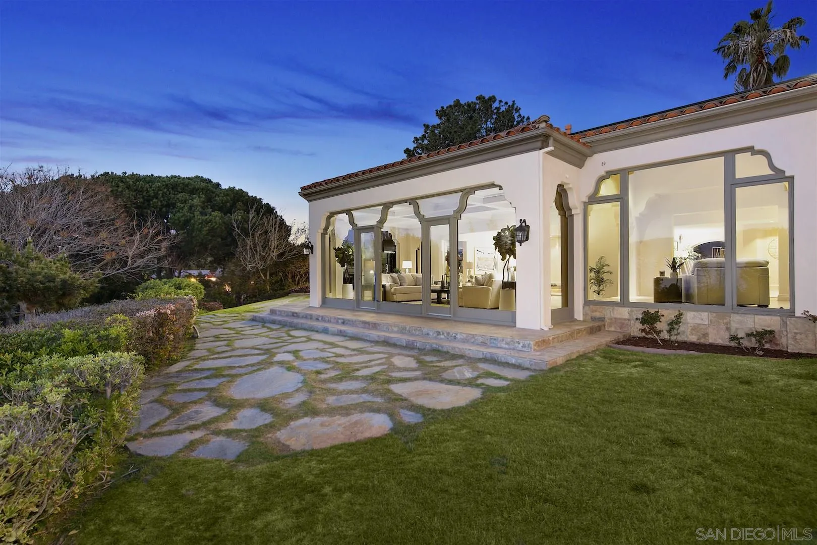 9660 Blackgold Road La Jolla, CA 92037 - Photo 4 of 32 a view of a house with backyard and porch