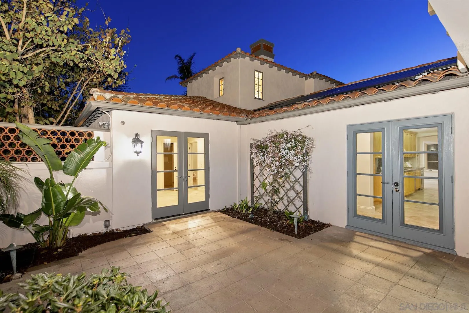 9660 Blackgold Road La Jolla, CA 92037 - Photo 7 of 32 front view of a house with a yard