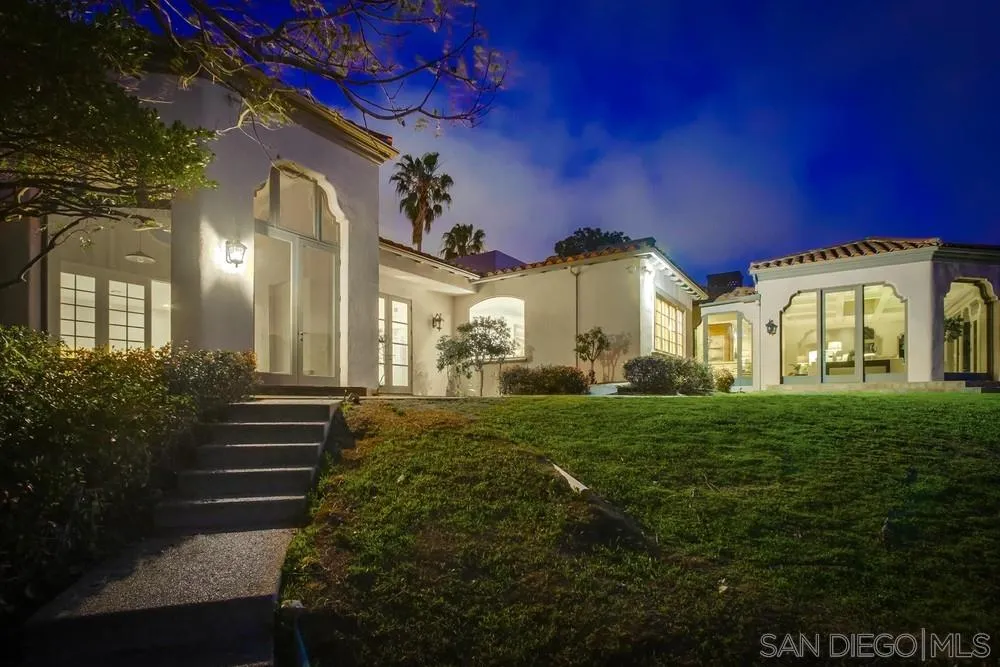 9660 Blackgold Road La Jolla, CA 92037 - Photo 10 of 32 a front view of a house with a yard