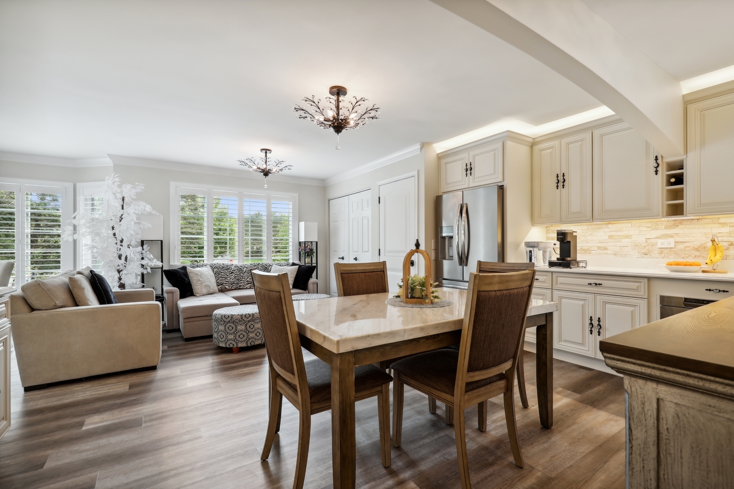 10508 Golf Road Orland Park, IL 60462 - Photo 14 of 50 a view of a dining room with furniture and wooden floor