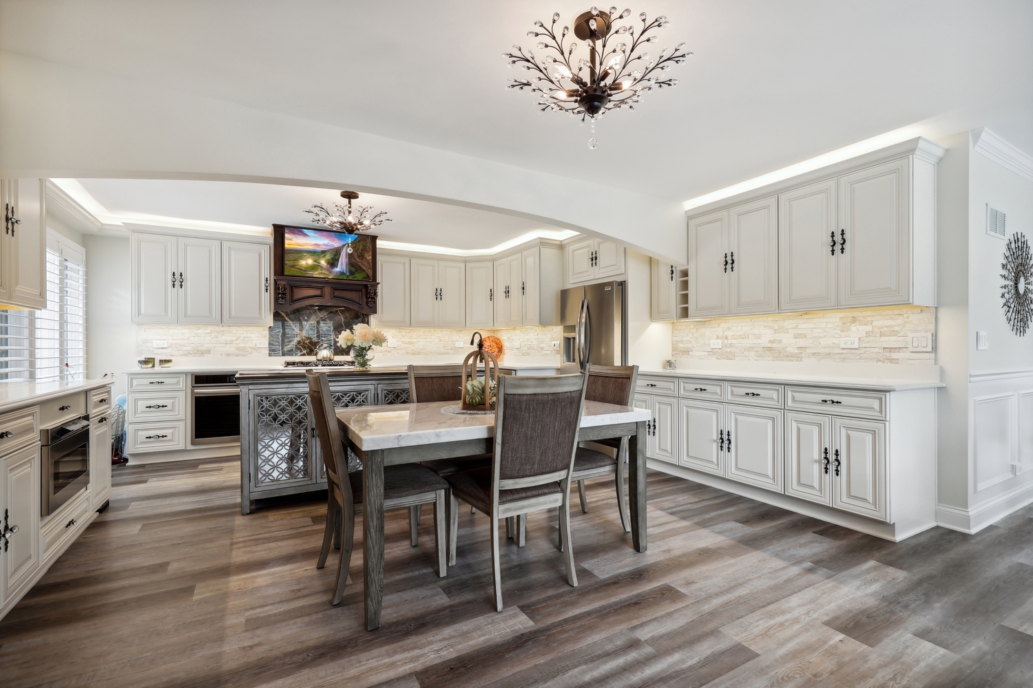 10508 Golf Road Orland Park, IL 60462 - Photo 16 of 50 a dining hall with stainless steel appliances kitchen island a table and chairs
