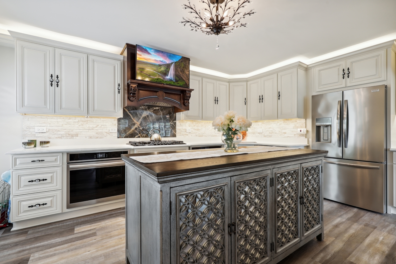 10508 Golf Road Orland Park, IL 60462 - Photo 17 of 50 a kitchen with stainless steel appliances a stove microwave and refrigerator