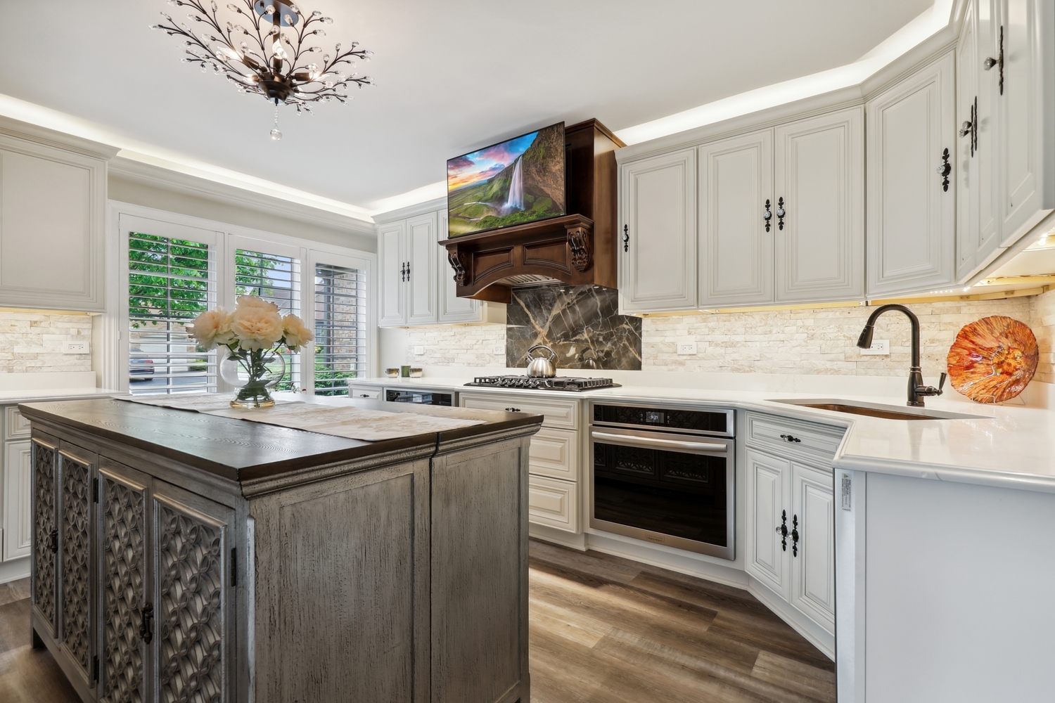 10508 Golf Road Orland Park, IL 60462 - Photo 18 of 50 a kitchen with stainless steel appliances granite countertop a sink stove and cabinets