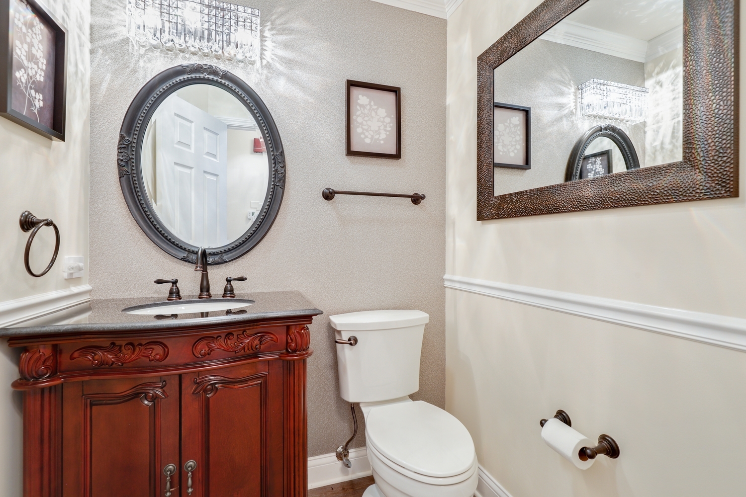 10508 Golf Road Orland Park, IL 60462 - Photo 26 of 50 a bathroom with a toilet a sink and mirror