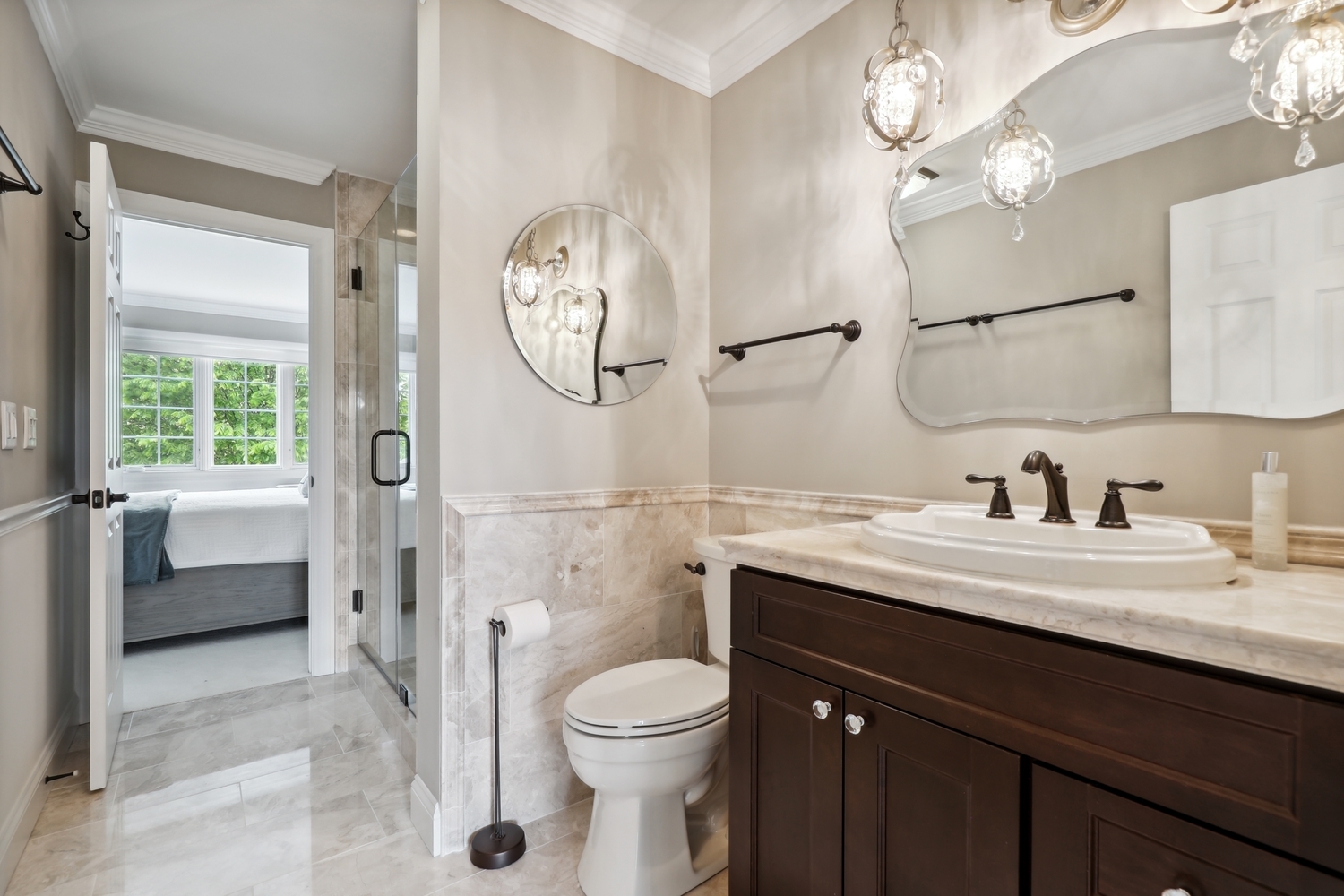 10508 Golf Road Orland Park, IL 60462 - Photo 30 of 50 a bathroom with a toilet a sink a mirror a vanity and window