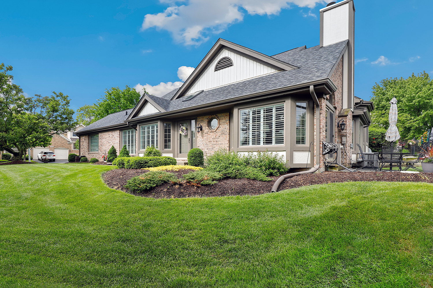 10508 Golf Road Orland Park, IL 60462 - Photo 3 of 50 a front view of a house with a yard and porch