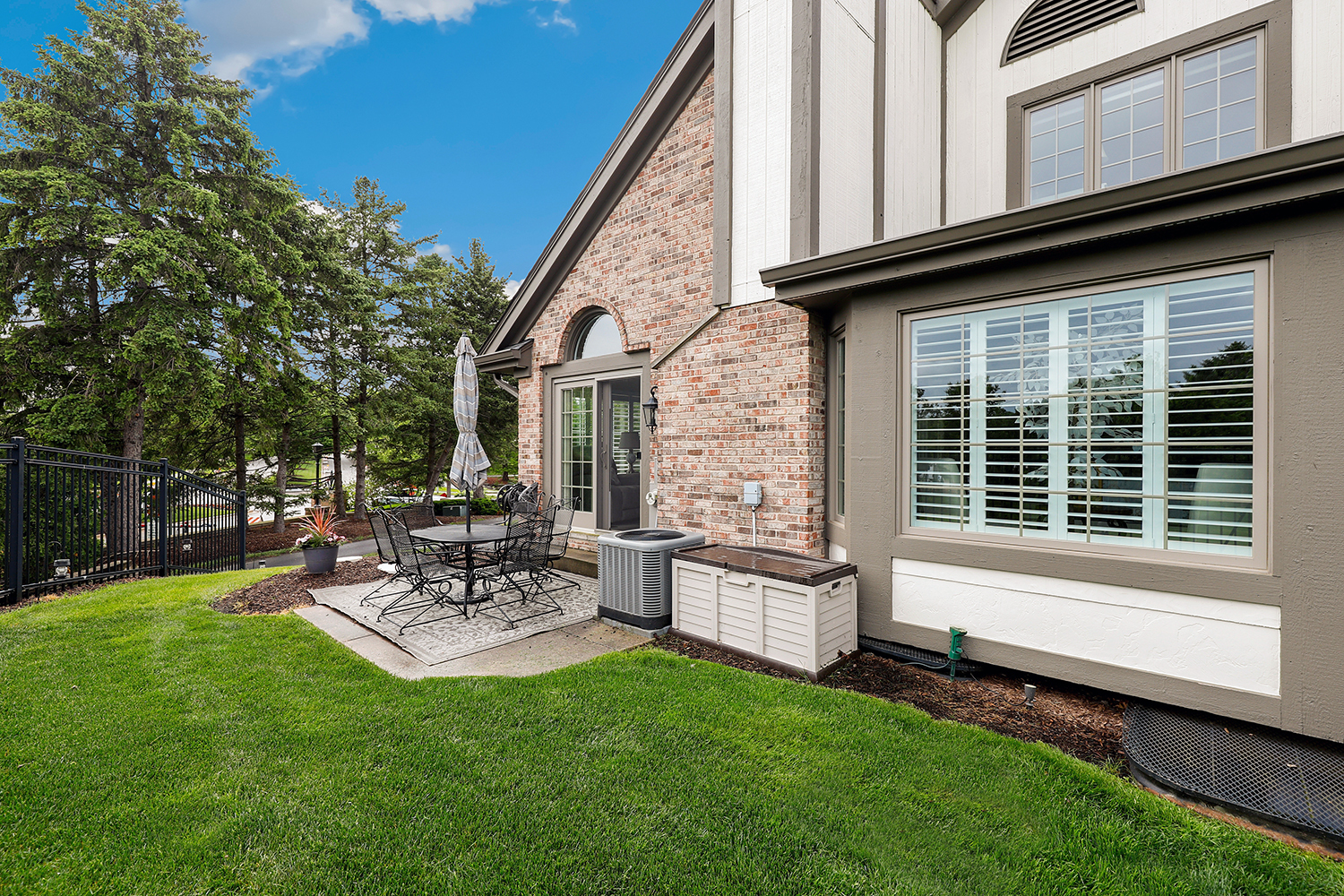 10508 Golf Road Orland Park, IL 60462 - Photo 35 of 50 a view of a house with backyard sitting area and garden