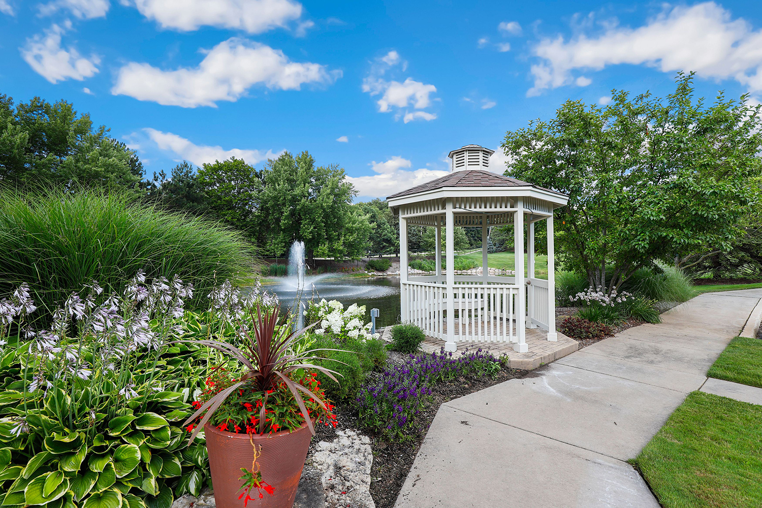 10508 Golf Road Orland Park, IL 60462 - Photo 44 of 50 a front view of a house with a garden