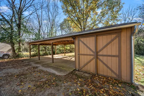 a backyard of a house with lots of green space