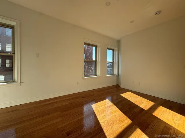 a view of an empty room and window