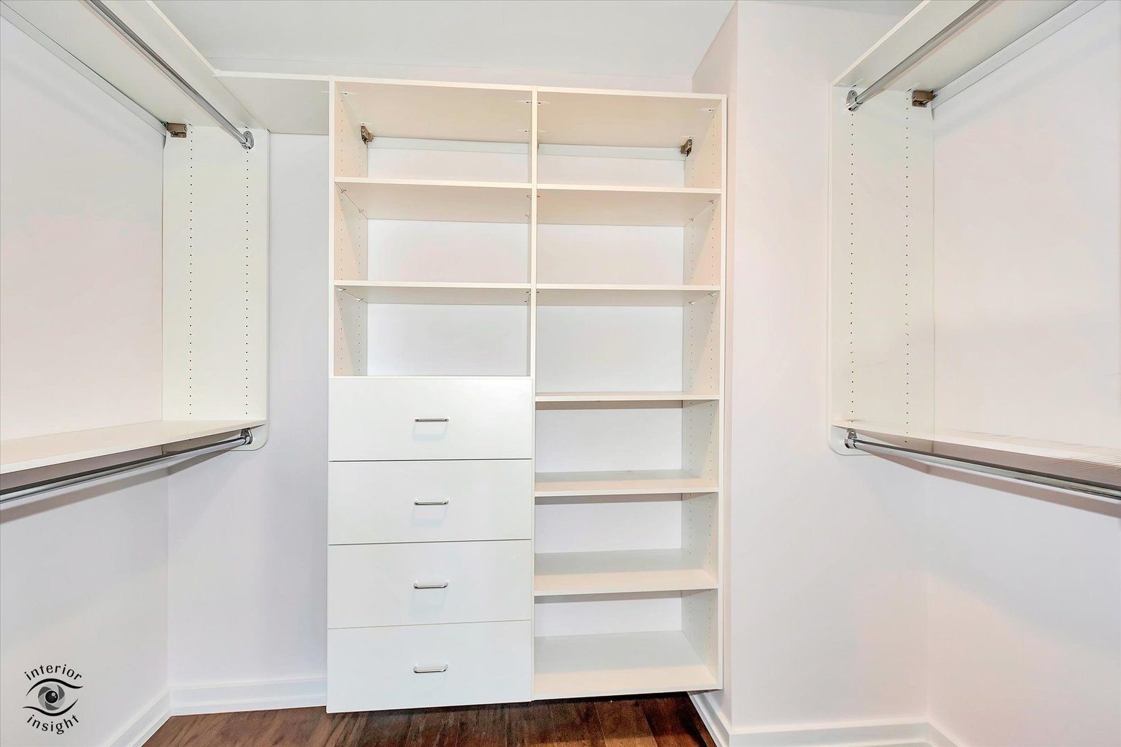 200 East Delaware Place, Unit 26E Chicago, IL 60611 - Photo 12 of 28 a view of walk in closet with empty racks