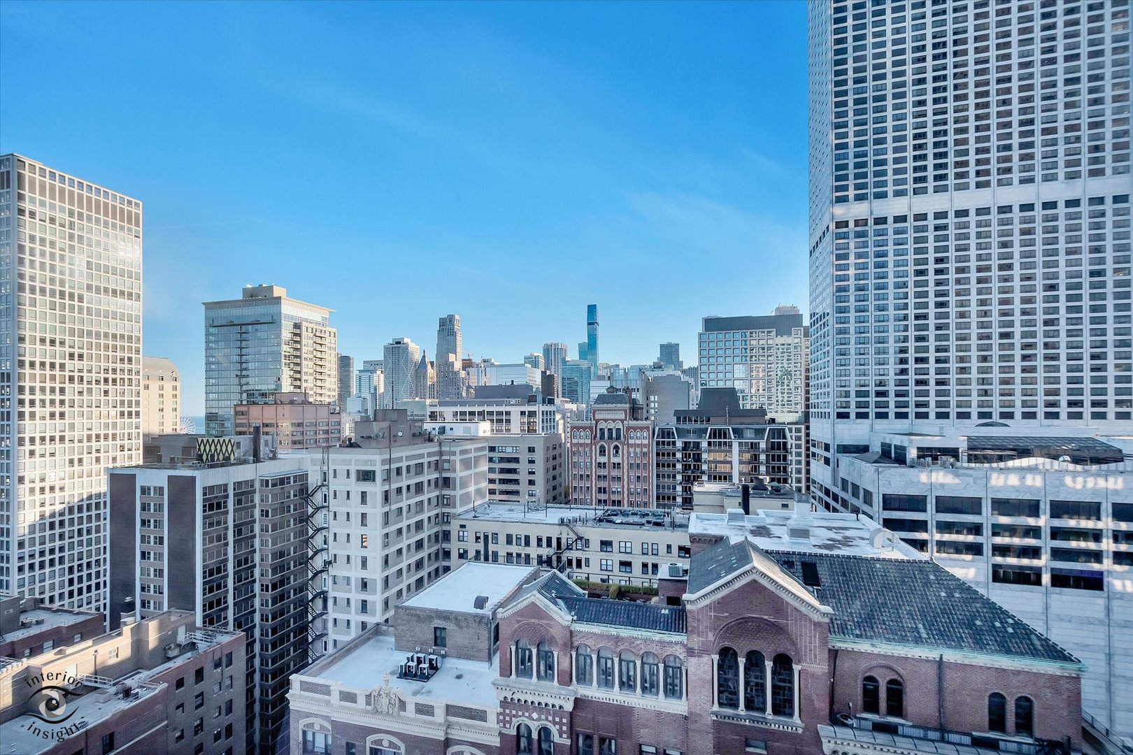 200 East Delaware Place, Unit 26E Chicago, IL 60611 - Photo 2 of 28 a view of a city with tall buildings