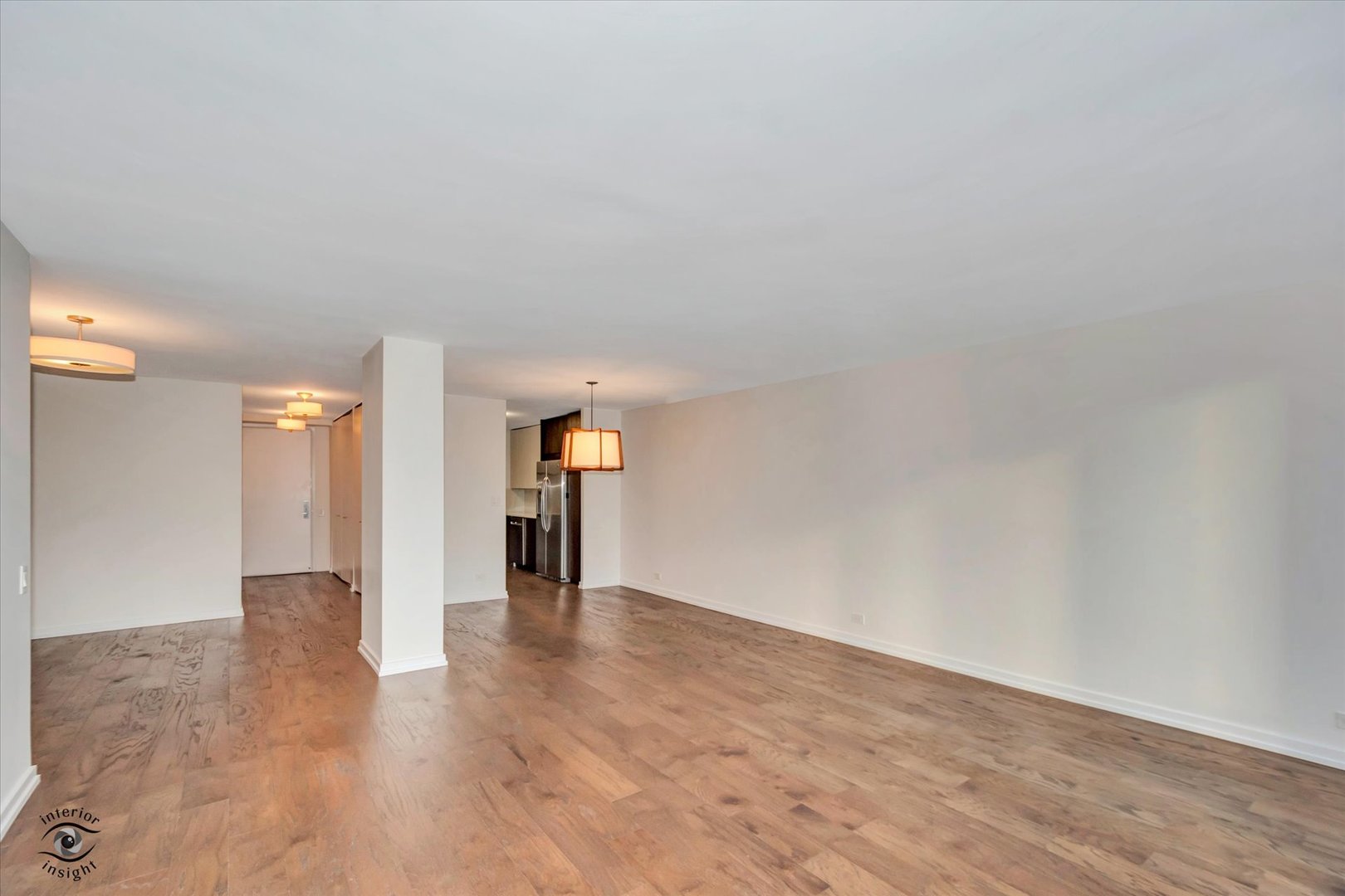 200 East Delaware Place, Unit 26E Chicago, IL 60611 - Photo 7 of 28 a view of an empty room and window