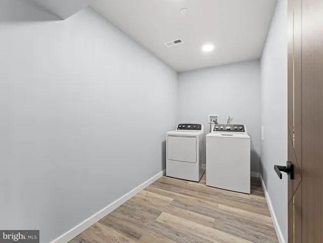 a view of utility room with washer and dryer