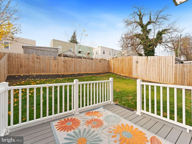 a view of a wooden fence