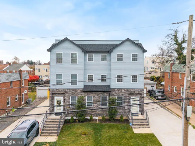 a aerial view of a house with swimming pool