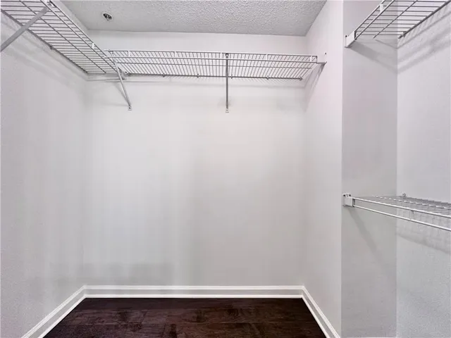 a view of a room with racks on the wall