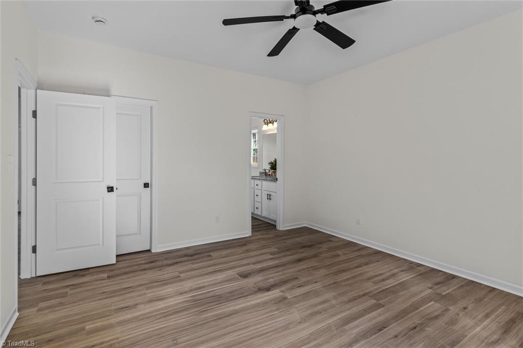 402 North Ward Avenue High Point, NC 27262 - Photo 16 of 28 Primary Bedroom with w/I closet and ensuite bathroom